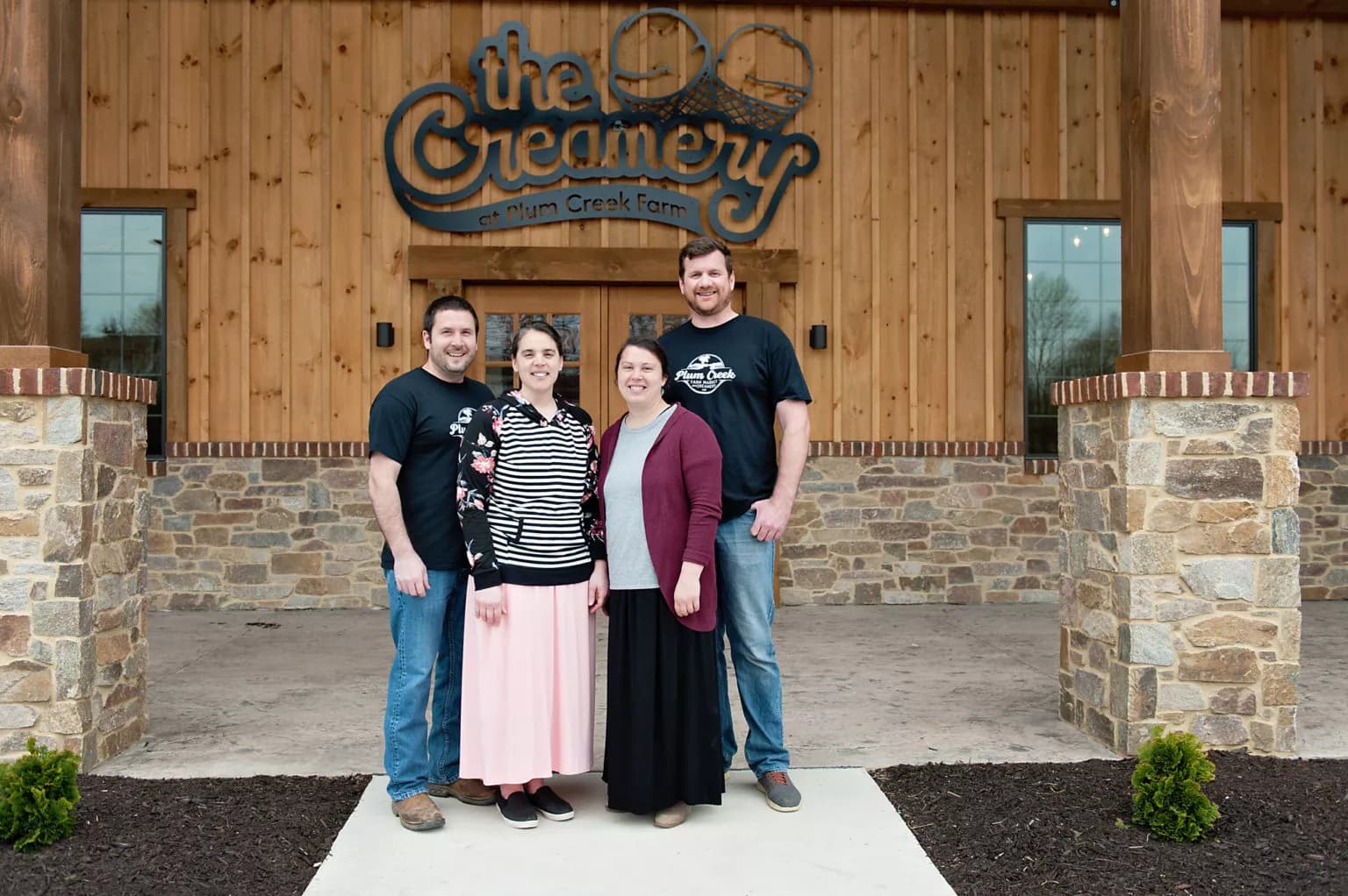 Group gathering in front of the Creamery