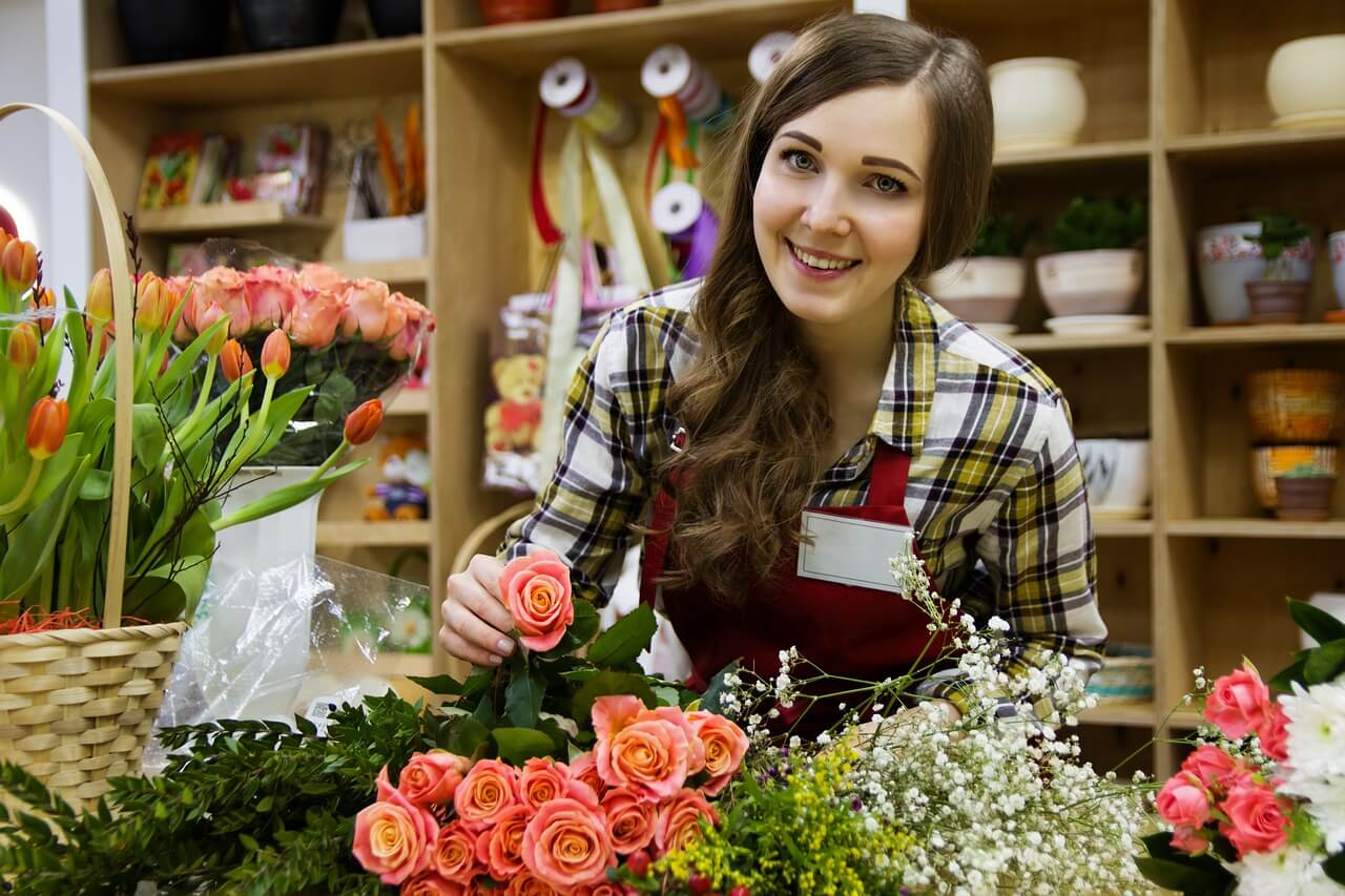 Florist with flowers in front