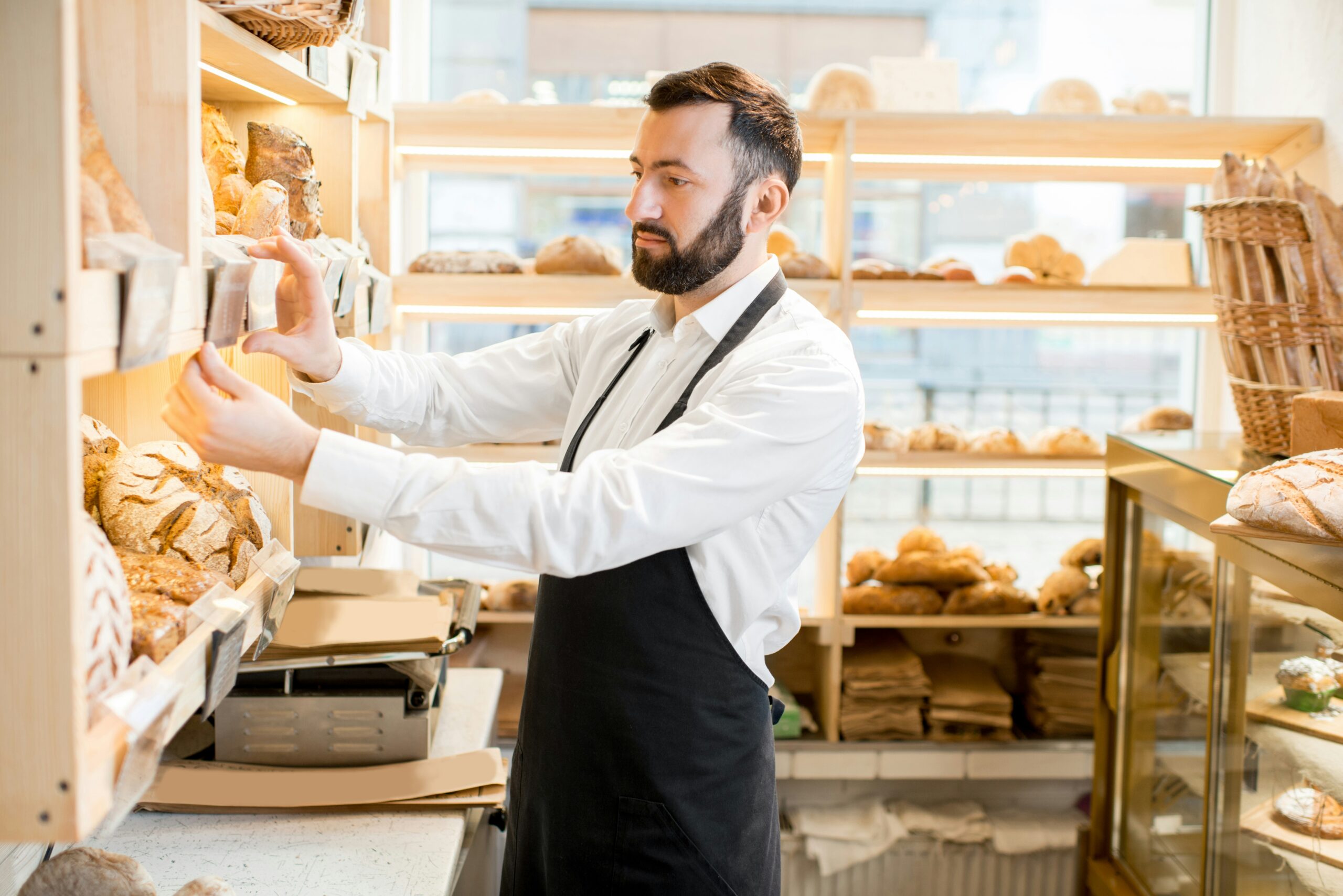 how much does it cost to start a bakery - man in a bakery